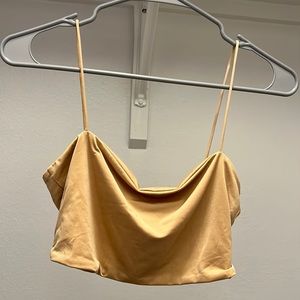 Light yellow/gold crop top